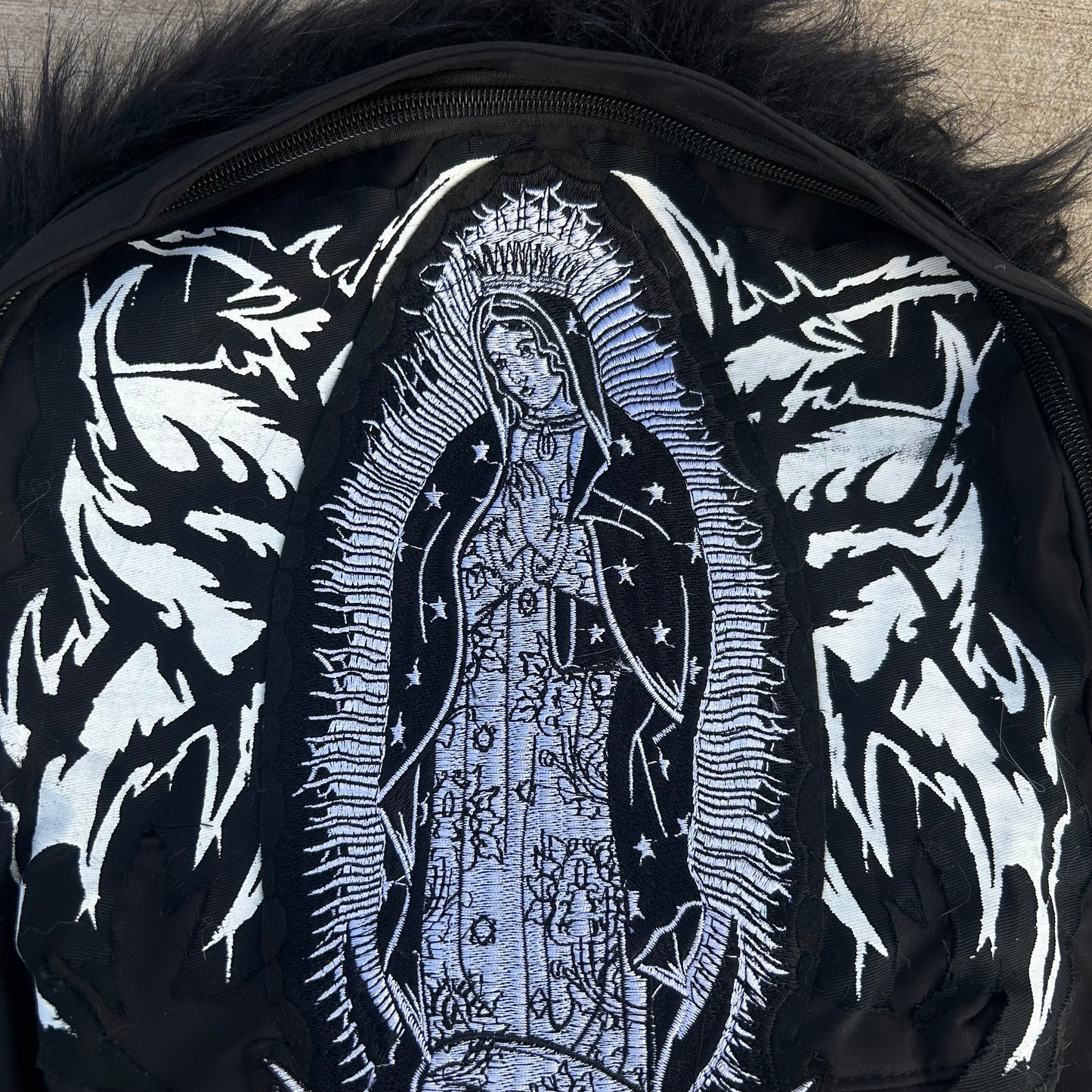 our lady 1/1 backpack