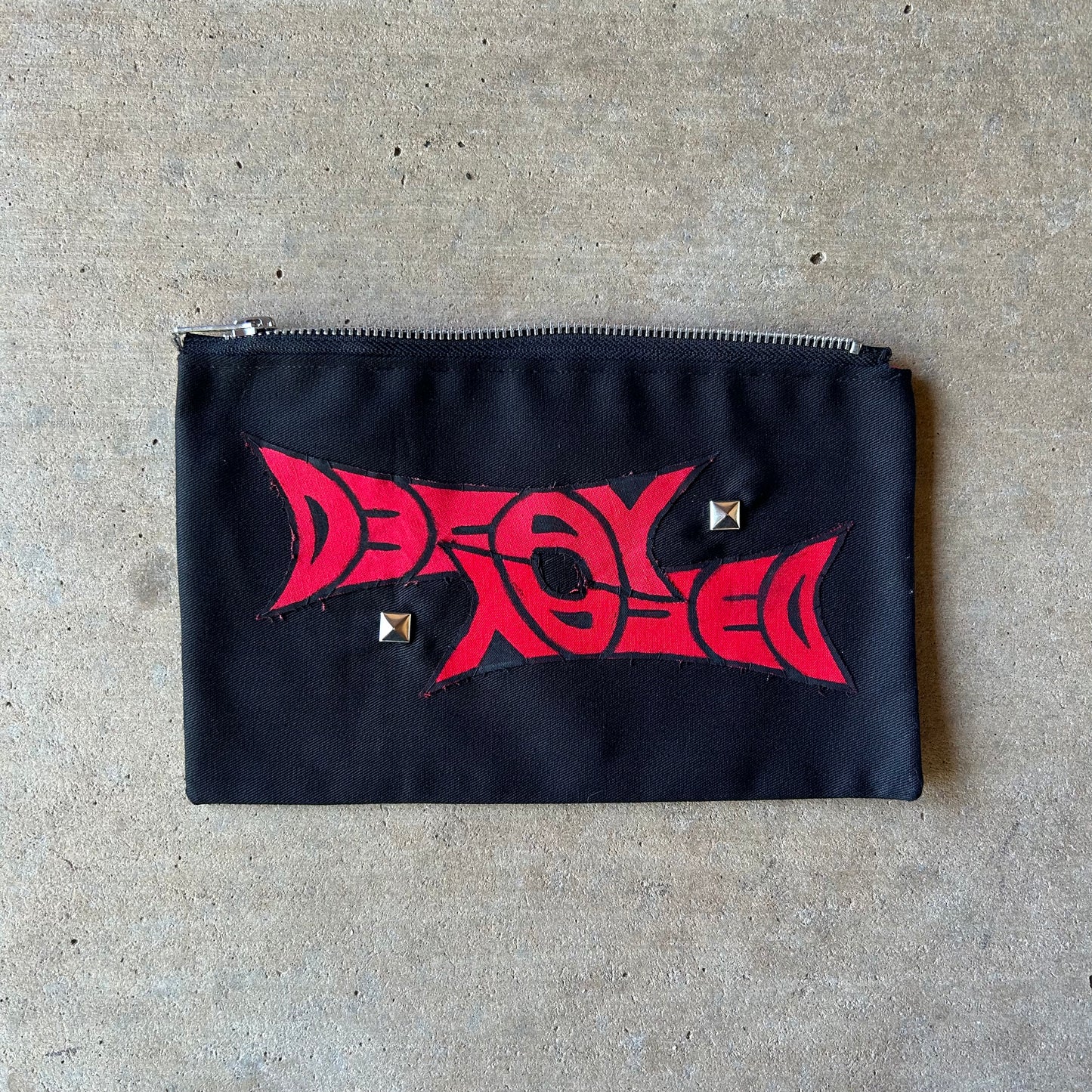 studded decay stash bag