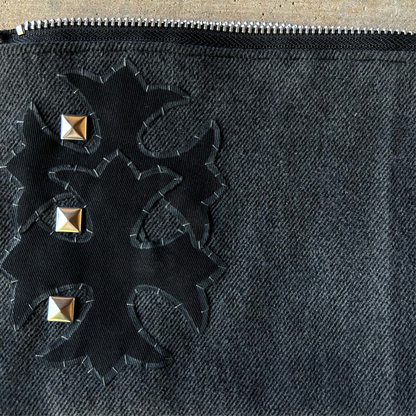 studded shadows stash bag