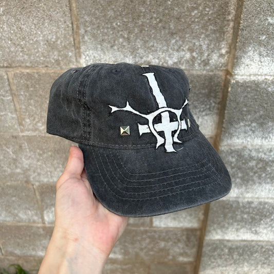 studded religion hat