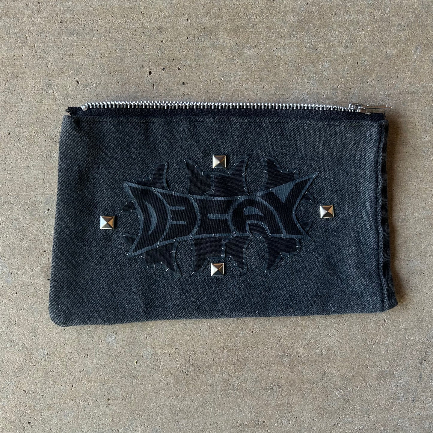 studded decay stash bag